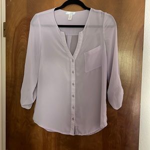 Sheer button up blouse.